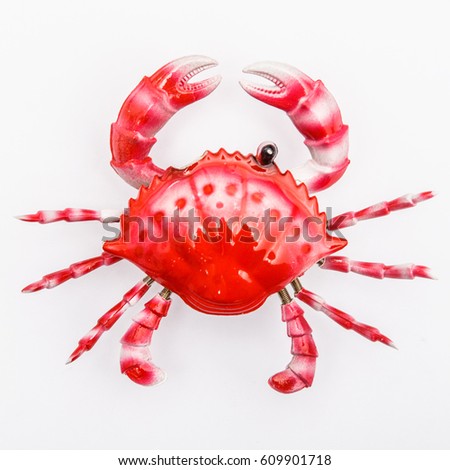 Red and White Toy Crab Fridge Magnet Isolated on White