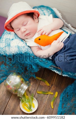 fisherman baby with fish