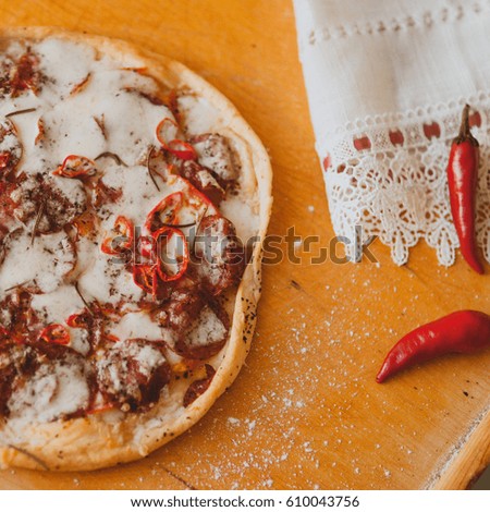Handmade italian tasty pizza with paperand cheese