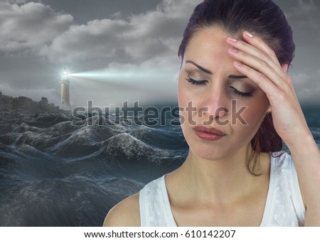 Digital composite of Stressed upset woman next to hopeful lighthouse