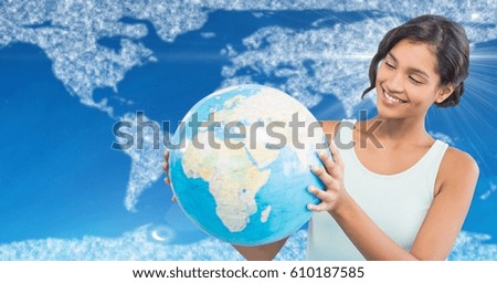 Digital composite of Woman with globe against map with clouds and blue background
