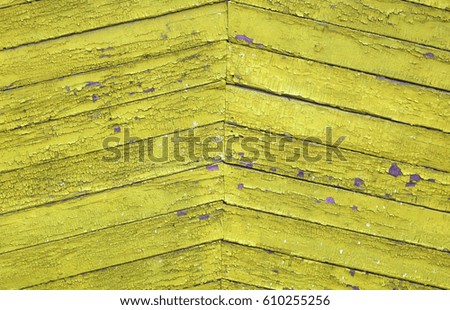 Old paint on a wooden fence, background