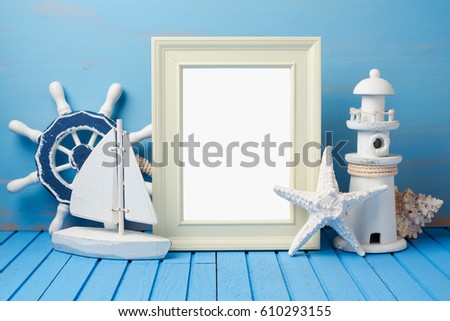Summer holiday vacation concept with photo frame and nautical decorations