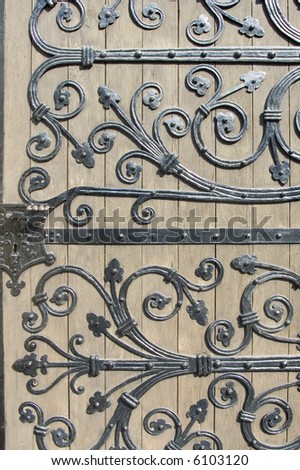 Ornamental wrought iron door in an old church in Berlin Germany
