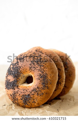 bagels With poppy seeds on white background