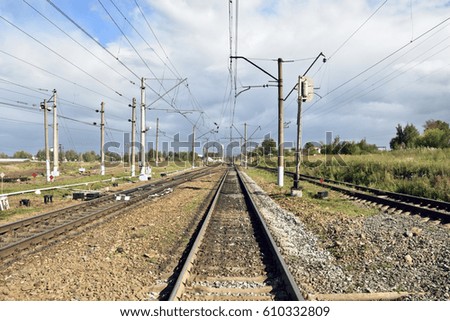empty railway tracks go straight to infinity