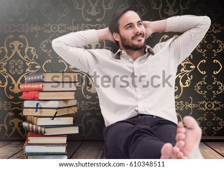 Digital composite of Man sitting relaxed with Books stacked by antique wallpaper decorative