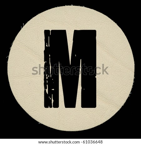 Letter a in leather, on a black isolated background. UPPERCASE