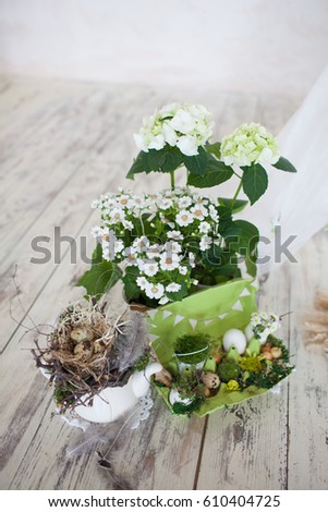 Easter decor with white flowers and eggs