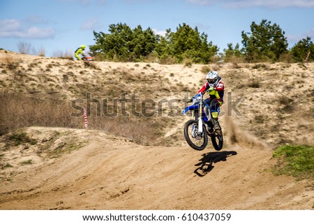 the rider on the motocross jump
