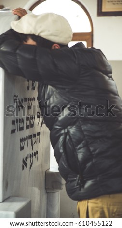 jewish prayer on holy Cemetery. baal shem tov matisyahu. Royalty-Free Stock Photo #610455122