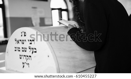 jewish prayer on holy Cemetery. baal shem tov matisyahu. Royalty-Free Stock Photo #610455227