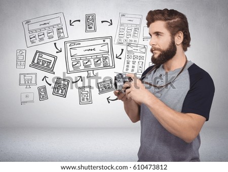 Digital composite of Man with camera and image screens graphic drawings