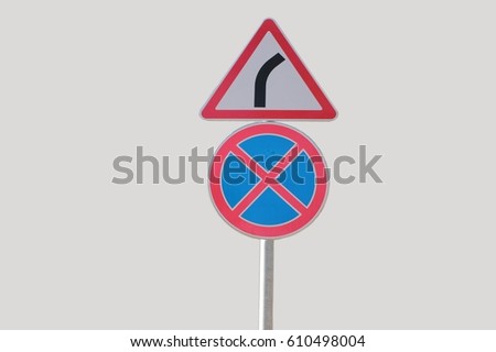 Road signs, stopping and Parking is prohibited and dangerous turn on a gray background