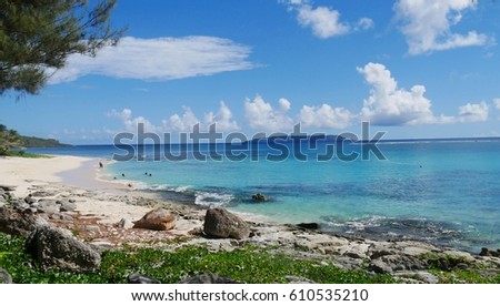 Tachogna Beach 1, Tinian
Description: Tachogna Beach is one of the most popular beaches on Tinian, Northern Mariana Islands known for its pristine blue waters and soft white sand.
 Royalty-Free Stock Photo #610535210