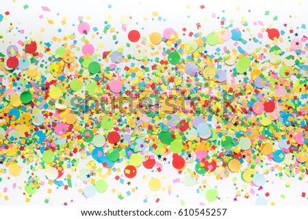 Colorful festive confetti. Decorating for a party. White background. 
