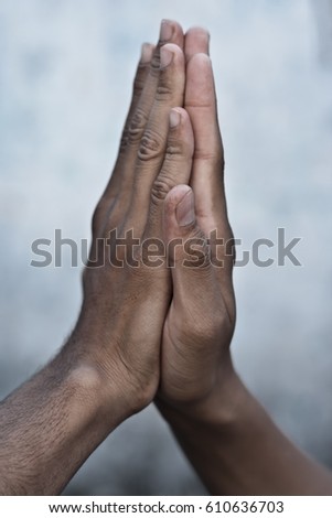Praying hands.