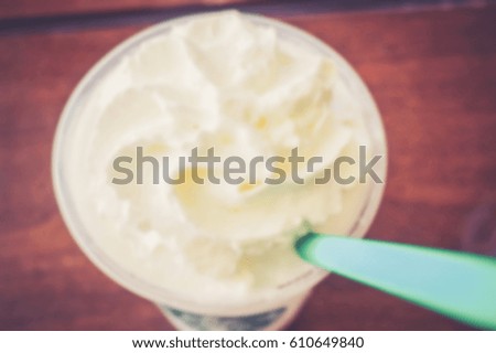 Background abstract blurred of Coffee mugs see the whipped cream on top.