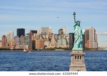 The landmark Statue of Liberty against the impressive New York City skyline.