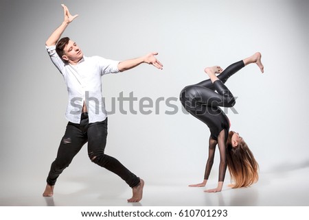 Two people dancing in contemporary stile
