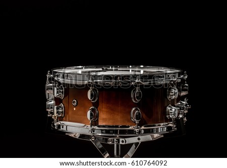 snare on a black background, musical instrument, musical concept