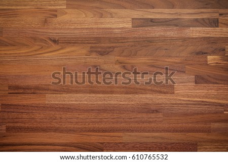 Walnut wood table texture background Royalty-Free Stock Photo #610765532