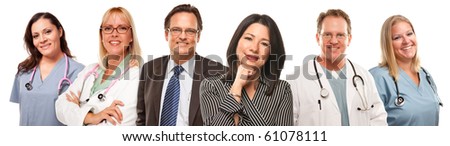 Hispanic Woman and Man with Doctors or Nurses Behind Isolated on a White Background.