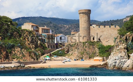 Vacation houses near the castle in Tossa de Mar, view from sea, Costa Brava, Spain.
