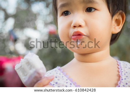 Cute Toddler Girl Eating Ice-Cream ,Girls eat ice-cream