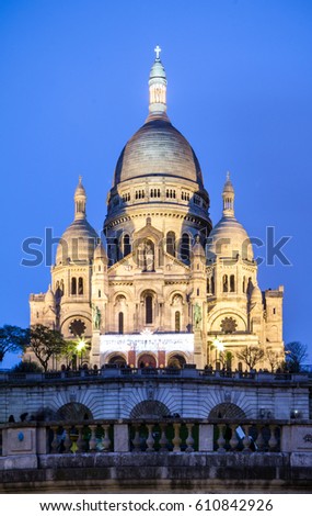 Evening view of Basilica Sacre Coeur in Montmartre in Paris, France