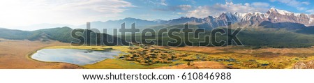 Mountain landscape, lake and mountain range, large panorama, Altai Royalty-Free Stock Photo #610846988