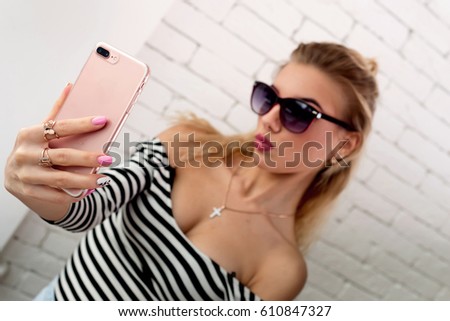 Beautiful girl makes selfie