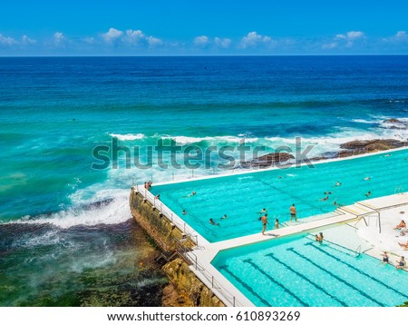 Bondi Beach with Swimming Pool in Sydney Royalty-Free Stock Photo #610893269