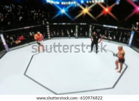 Blurred background. mma fight octagon stage. ring extreme Sport mixed martial arts competition tournament