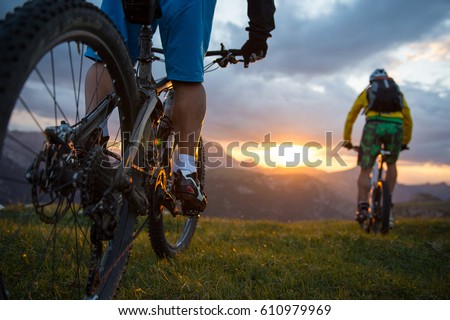 mountainbike sunset-sunrise Royalty-Free Stock Photo #610979969