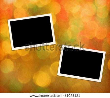 photo frames on a paper with background lights.