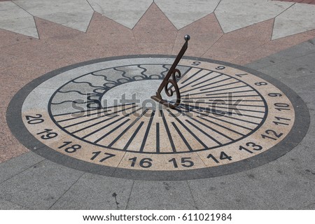Sun clock on the ground showing time in Crimea Royalty-Free Stock Photo #611021984