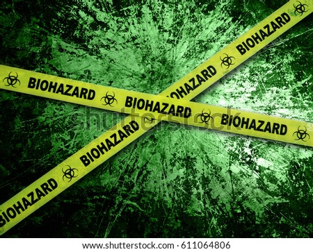 Yellow biohazard tape across and grunge green background                               