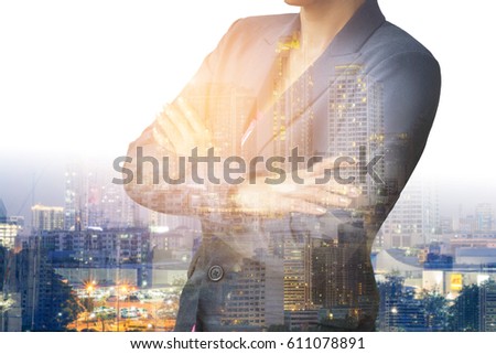  businesswoman. Double exposure, city on the background. Blurred background,