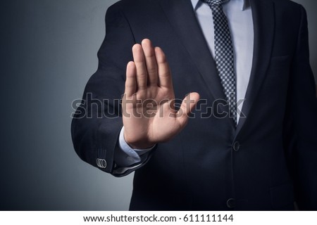 An empty workpiece. Gesture "stop". The businessman says "no." Royalty-Free Stock Photo #611111144