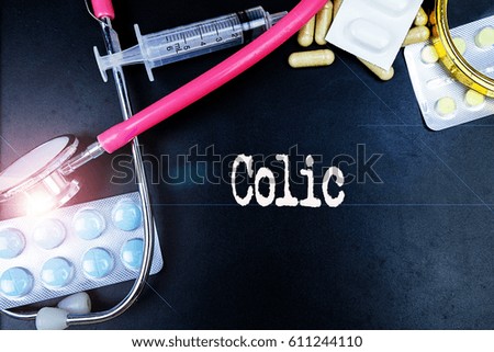 Colic word, medical term word with medical concepts in blackboard and medical equipment