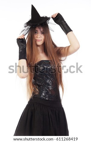 Portrait of Charming witch on white background studio
