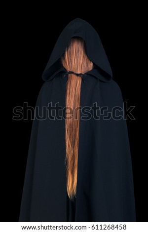 Portrait of Witch without a face on gray background studio