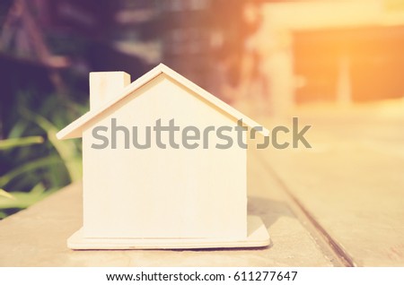 image of vintage wooden houses decoration on wooden table.
