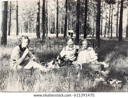 USSR, LENINGRAD - CIRCA 1950: Vintage photo of picnic in summer city park