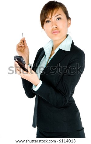 A young attractive Asian businesswoman with handheld computer on white background