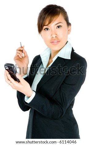 A young attractive Asian businesswoman with handheld computer on white background