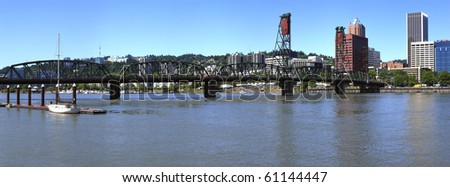 The Hawthorne bridge and Dragon boats race on the Willamette river, Portland OR.