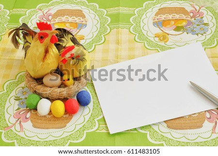 Cheerful Easter greeting. Chicken, rooster, chick and eggs in a nest