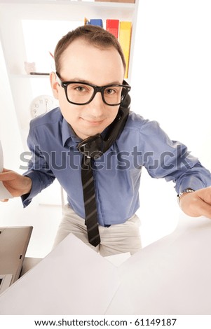 funny wideangle picture of businessman in office